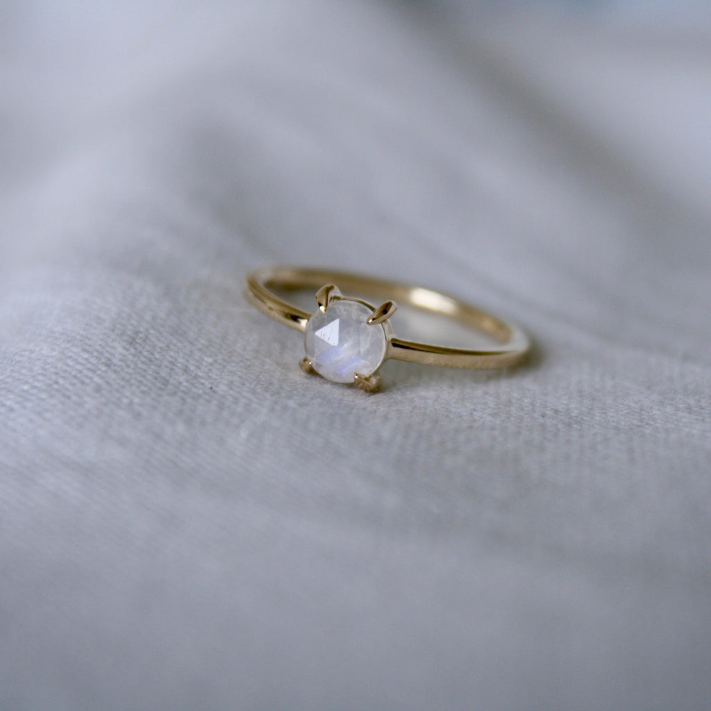A dainty 9ct gold ring with a rose cut moonstone in a claw setting by Jade Rabbit Design
