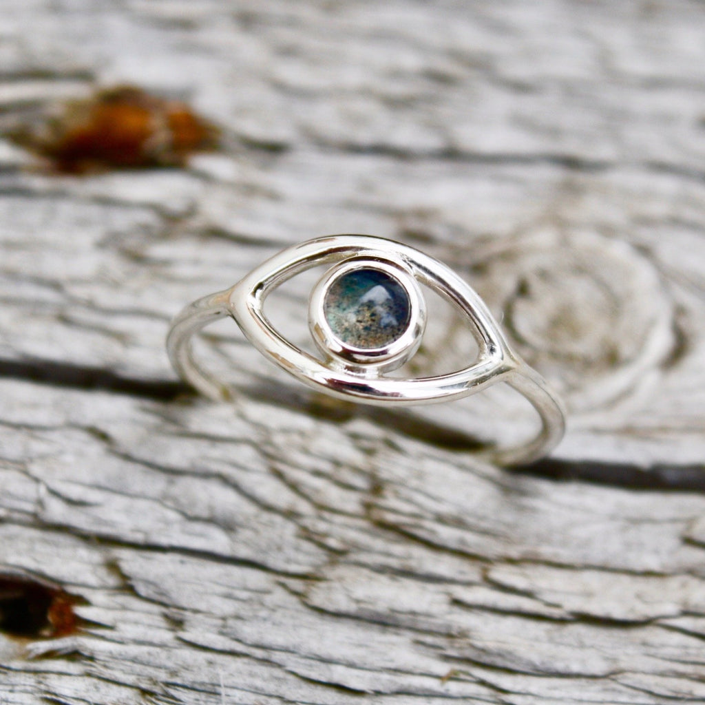 A dainty all seeing eye ring with a labradorite set in the centre by Jade Rabbit Design