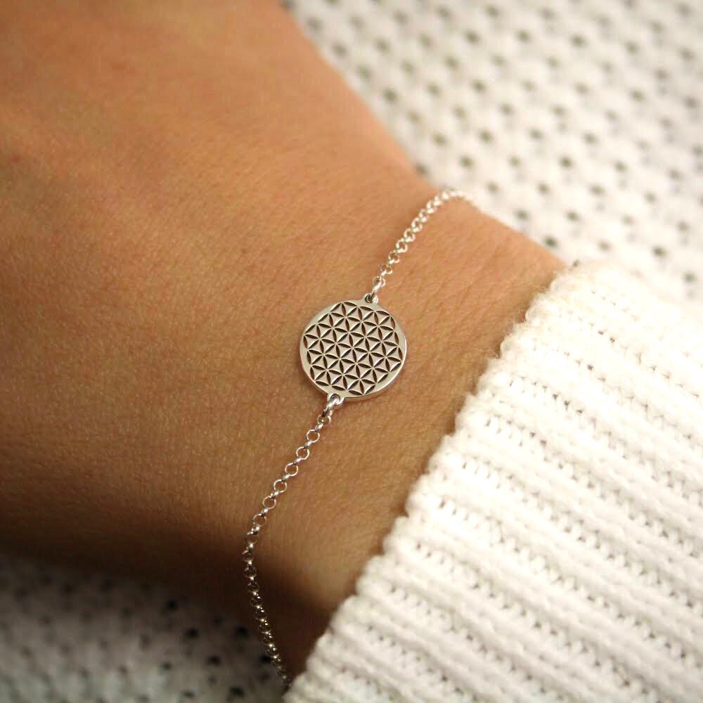 A sterling silver flower of life bracelet by Jade Rabbit Design